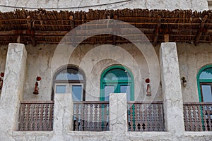 Facade of an old Arabic house. Old arabian architecture