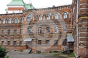 Facade of an old brick building in Moscow. Old residential building