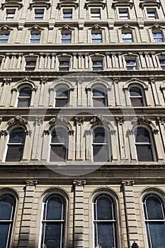 Facade of old building in downtown Montreal, Canada