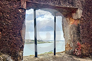 the facade of an old building with windows and doors. Fort Jesus is Portuguese fortification in Mombasa, Kenya. It was