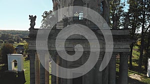 Facade of the Old Catholic Church, Stone Statues and Colons