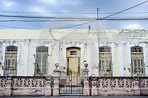 Facade of an old colonial house in Cienfuegos, Cuba