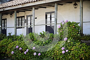 Facade of an old house with colonial architecture in the rural sector of the Iloca coast. Chili
