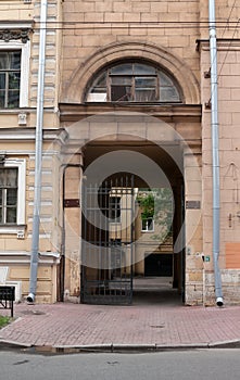 Facade of old house with podvortney and downpipes