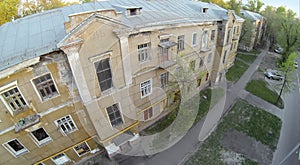 Facade of old house at spring day. Aerial photo