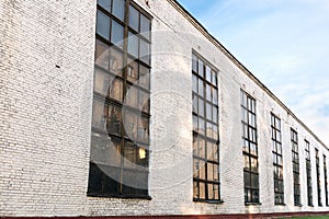Facade of an old industrial factory building. wide angle view.