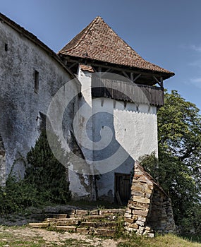 Facade of an old medieval church fortress in Viscri, Transylvania, Romania