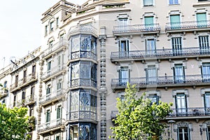 Facade of old Modernist apartment buildings in el Eixample, Barcelona, Catalonia, Spain