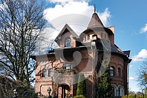 Facade of old red brick house in Kaliningrad