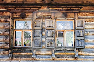 Facade of the old Russian log houses in Suzdal