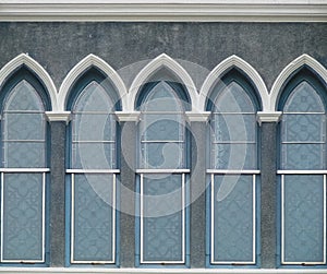 Facade of Old Stucco Glass Window