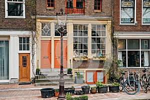 Facade of old typical house in Amsterdam historical center, Netherlands