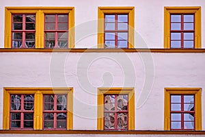 Facade with orange framed windows