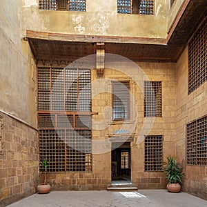 Facade of ottoman era historic house of Moustafa Gaafar Al Seleehdar, Cairo, Egypt, with interleaved wooden windows Mashrabiya photo