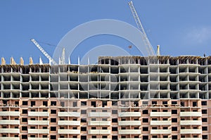 Facade of a panel house under construction.
