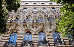 The facade of Parisian building, France.