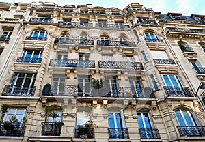 The facade of Parisian building, France.