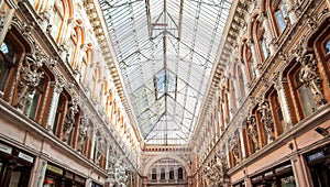 Facade of Passage, a historical building with baroque statues, sculptures and ornaments in the old town of Odessa