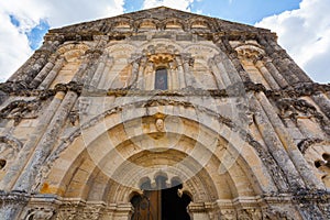 Facade of Petit Palais et Cornemp romanesque church, Gironde France