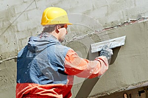 Facade Plasterer at work