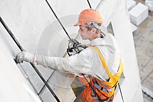 Facade Plasterer worker at work