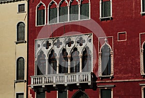 Facade Of A Purple Red Venetian Renaissance Building On The Canale Grande In Venice Italy