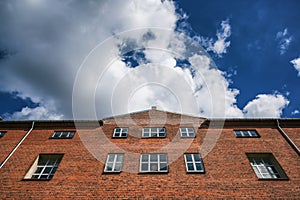 Facade of red brick building against the blue sky, Scandinavian