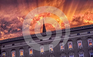 Facade of Residence Gallery in Salzburg with dramatic sunset