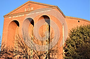 Facade and right side, illuminated by the golden color of the setting sun, of the church of San Prosdocimo in Pontecorvo in Padua.