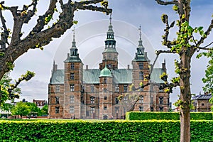 Facade of the Rosenborg Castle in Copenhagen, Denmark with a park in front of it
