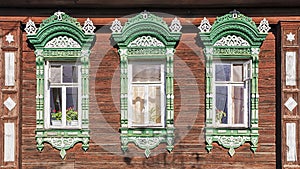 Facade Russian house with carved architraves