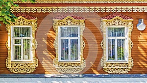 Facade Russian house with carved architraves