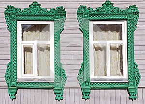 Facade Russian house with carved architraves