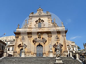 Facade Saint Peter`s cathedral against blue sky, Modica, Sicily, Italy