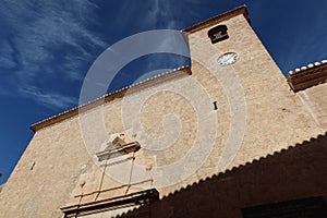 Facade of the San Lorenzo Martir Church, 16th century. Busot, Alicante, Spain photo
