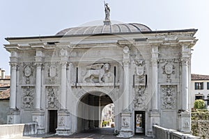 facade of san Tomaso monumental entrance in city walls, Treviso, Italy