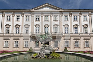 Facade of Schloss Mirabell Palace, with a bronze Pegasus on Pegasus Fountain in front, sculptor Kaspar Gras, Salzburg Austria