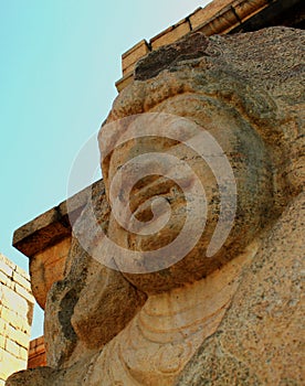 The facade sculpture with wall and sky of the ancient Brihadisvara Temple in Gangaikonda Cholapuram, india.