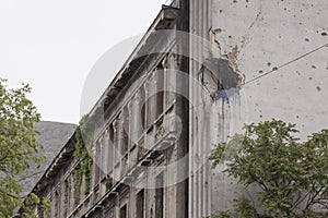 Facade with signs of fighting during the war in Mostar, Bosnia