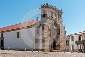 Facade of the sixteenth century Gothic Manueline church with a three bells belfry, Parish church in the main square of the town of