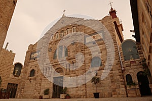 Facade of the St. John the Baptist Roman Catholic Church in Madaba, Jordan
