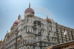 Facade of The Taj Mahal Palace hotel in Colaba district. Taj Mahal hotel famous building of touristic part in Mumbai photo