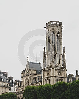 Facade and tower of Saint-Germain-l`Auxerrois Church in downtown Paris, France