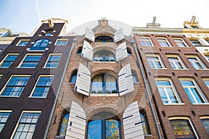 Facade of a traditional house in Amsterdam. Windows detail