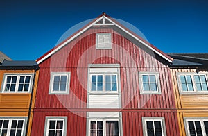 Facade of a traditional Rorbu red house on Lofoten islands, Scandinavian architecture details