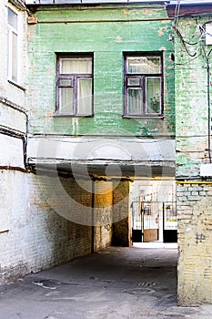 Facade of the two-storey white brick building