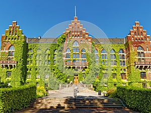Facade of the university library in Lund Sweden The building of architecture overgrown with greenery