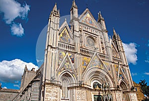 Facade view of the opulent and monumental Orvieto Cathedral in Orvieto.