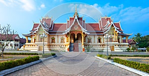 Facade of Wat That Luang Neua near golden stupa in Vientiane