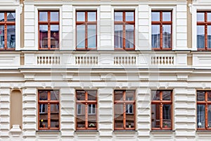 A facade of a windowed building in Germany